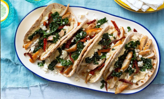 Chicken and hummus flatbread "tacos" with Greek kale salad