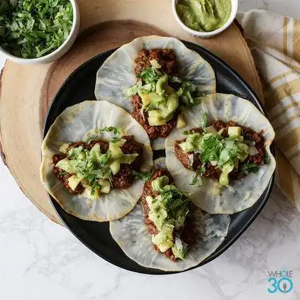 Pastured pork tacos al pastor with Avocado salsa