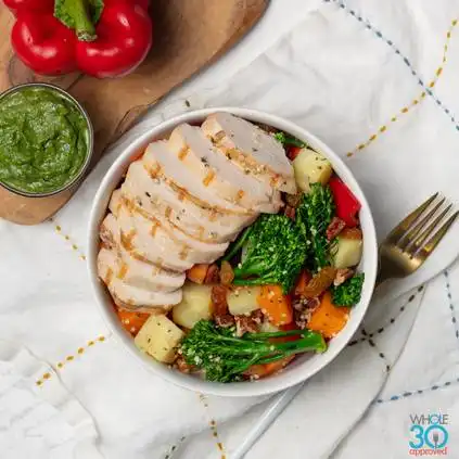 Pasture-raised grilled chicken green goddess bowl with rainbow veggies