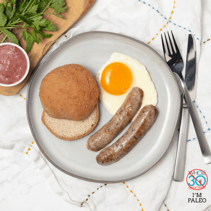 MM Classic breakfast with grain-free paleo roll, sausage, eggs and raspberry jam