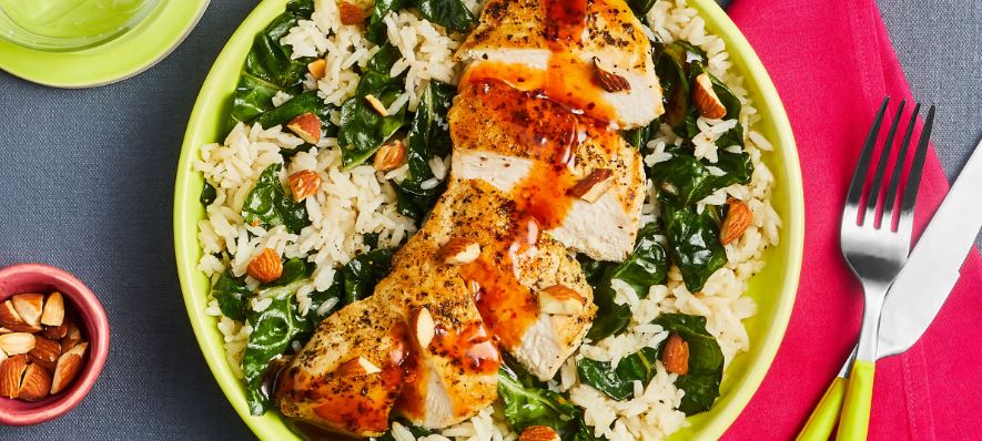 Chicken with Garlic Chard Rice Apricot Pan Sauce, Roasted Almonds