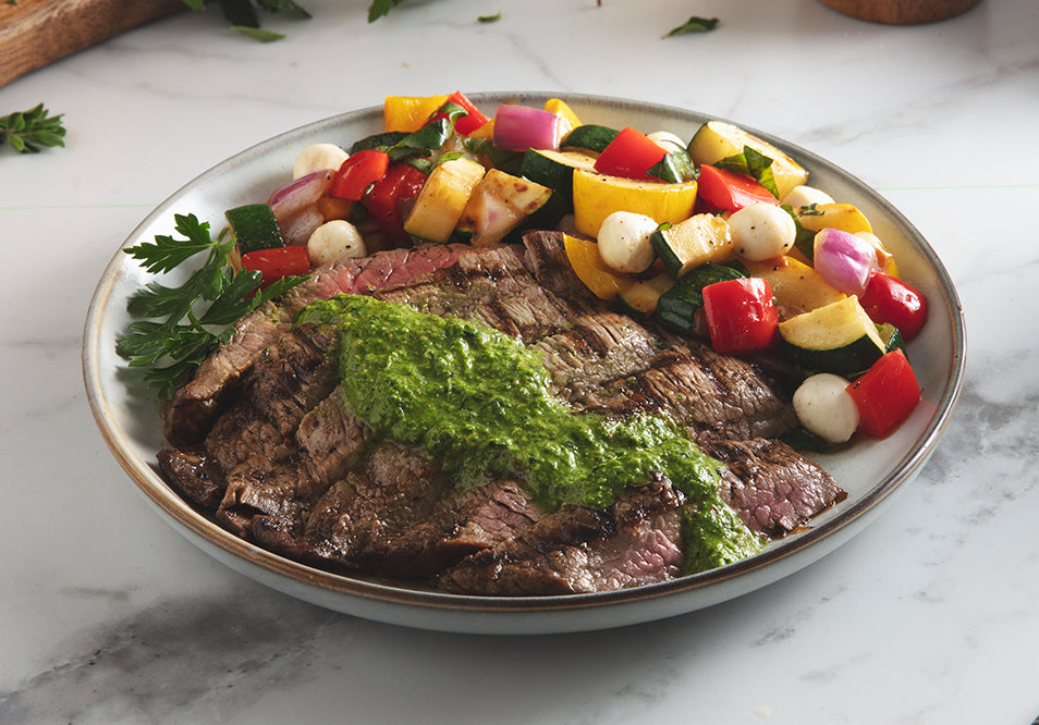 Grilled Grass Fed Steak with Salsa Verde Roasted Summer Vegetable and Fresh Mozzarella