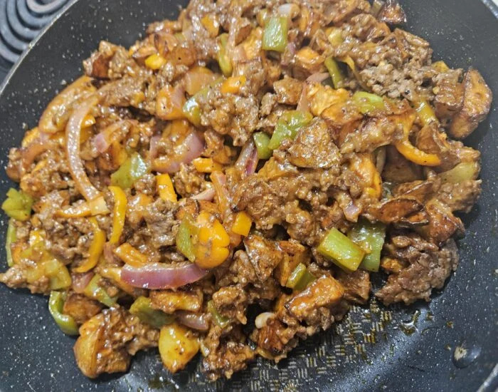 Cheesy Smokehouse Beef Hash with green pepper, pickled onion and Lime from EveryPlate, as plated at home by a MealFan reader