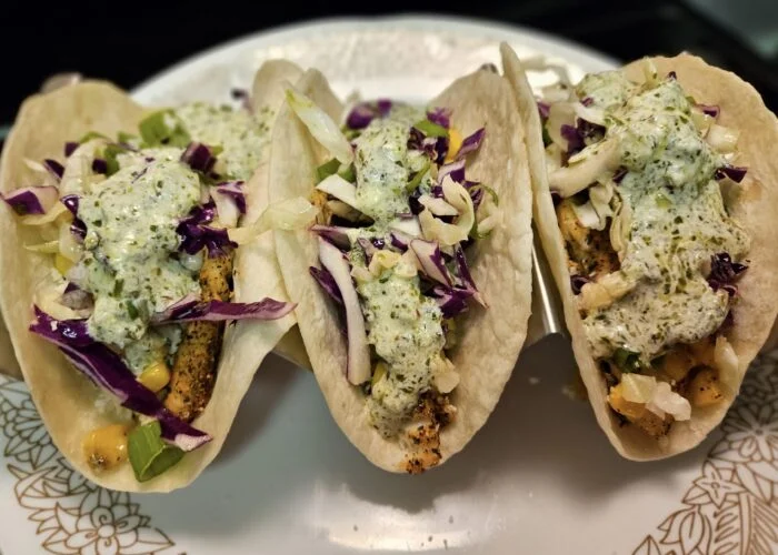 TILAPIA TACOS WITH COTIJA STREET CORN chimichurri crema, zesty cabbage slaw, scallion from Green Chef, photographed by u/cera84.