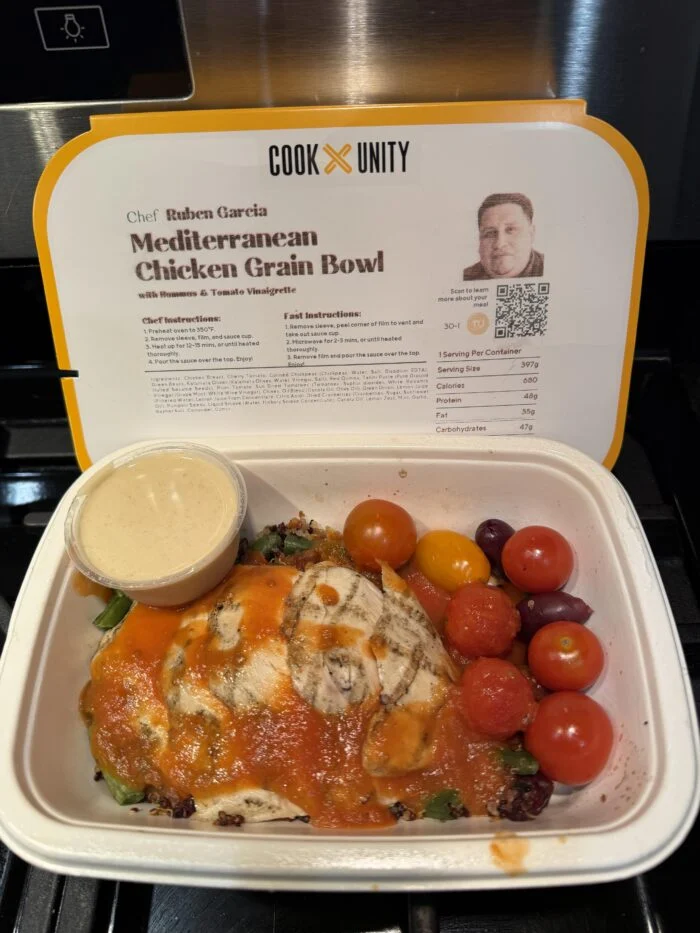 CookUnity chicken with quinoa and hummus in the tray