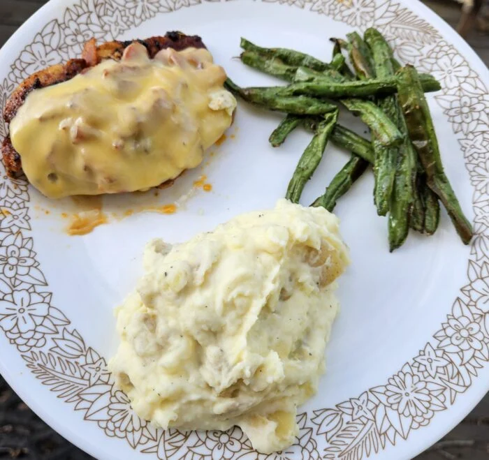Gouda & Bacon Smothered Chicken with Green Beans & Whipped Potatoes from EveryPlate, as plated at home by a MealFan reader
