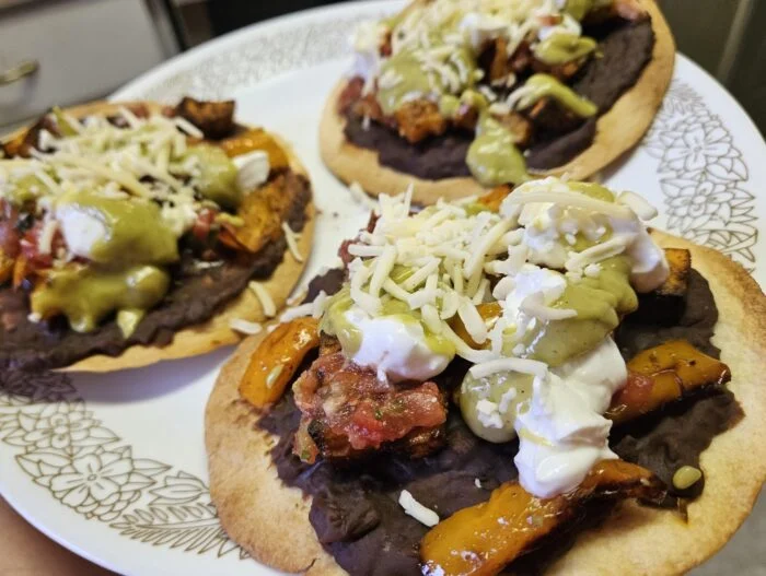 HelloFresh sweet potato and black bean tostadas with bell pepper, salsa, guacamole, sour cream and shredded cheese