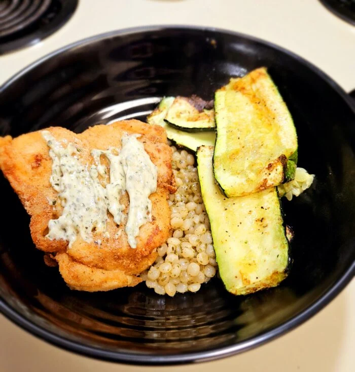 Crispy Chicken & Charred Zucchini bowls with Couscous and Creamy Pesto from EveryPlate, photographed by u/cera84.