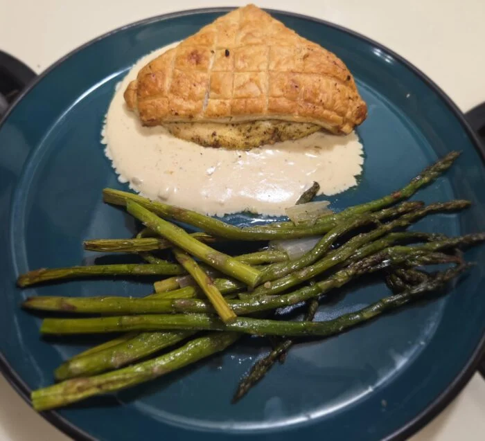 Puff Pastry Wrapped Chicken with Shallot Cream Sauce from Home Chef, photographed by u/cera84.
