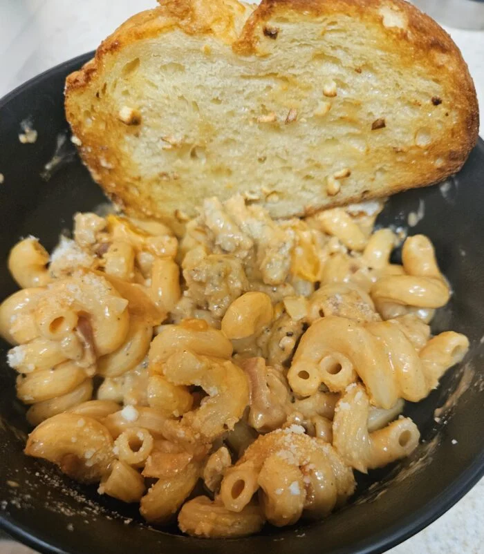 Tomato Chicken Sausage Cavatappi with Roasted Garlic and Bell Pepper from EveryPlate, as plated at home by a MealFan reader