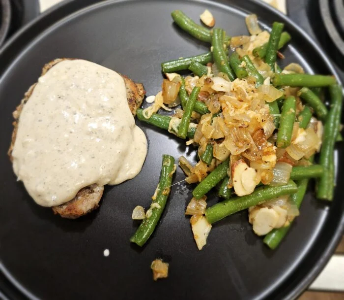 Pork Chop with Truffle Cream Sauce & Green Beans from Green Chef, photographed by u/cera84.