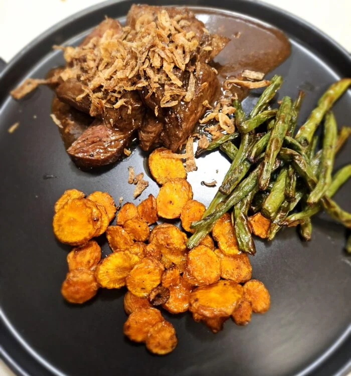 Seared Steaks & BBQ Pan Sauce with Honey Roasted Vegetables from Marley Spoon, as plated at home by a MealFan reader