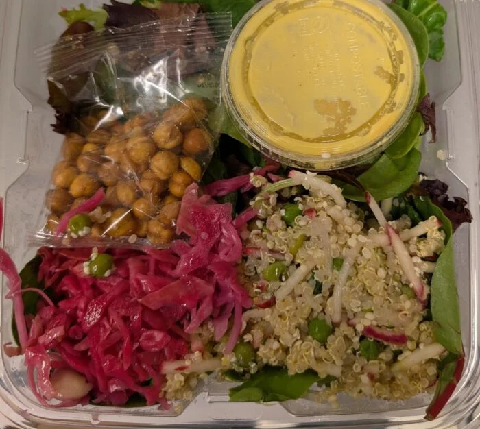 Thistle Golden Tahini Salad in its clear container, dressing cup and chickpea packet unopened