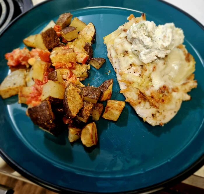Sheet Pan Cheesy Artichoke Chicken with Roasted Potatoes from Home Chef, photographed by u/cera84.
