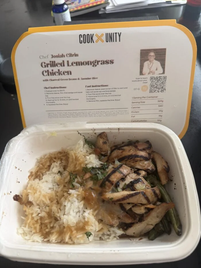CookUnity grilled lemongrass chicken with green beans and jasmine rice in its tray.