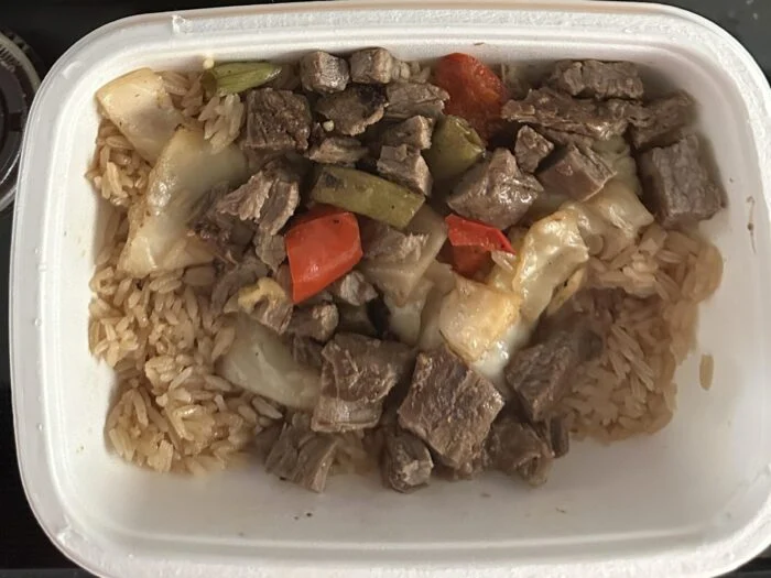 Reader photo of CookUnity Peruvian beef fried rice with beef, peppers and onion in its delivery tray