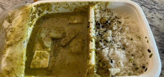 CookUnity tofu green curry with rice in its divided tray.