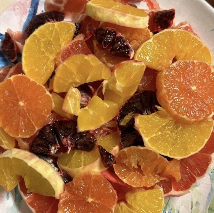 Sliced citrus for a reader prepared Dinnerly salad, before adding the toppings.