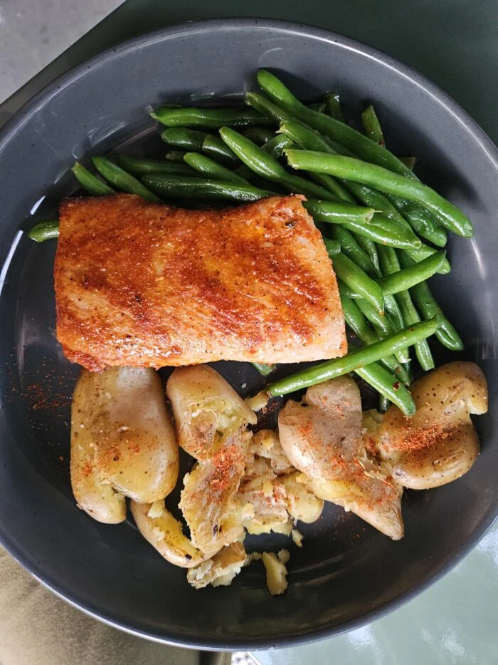 Reader-prepared Hungryroot blackened mahi mahi with smashed fingerling potatoes and green beans.