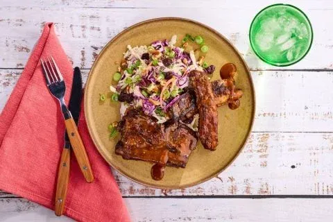 BBQ ribs and creamy coleslaw with dried cherries and pecans