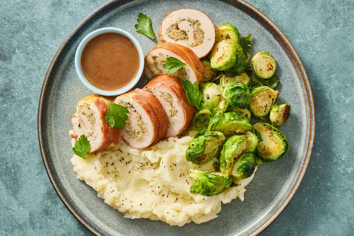 Prosciutto Wrapped Herb Stuffed Chicken