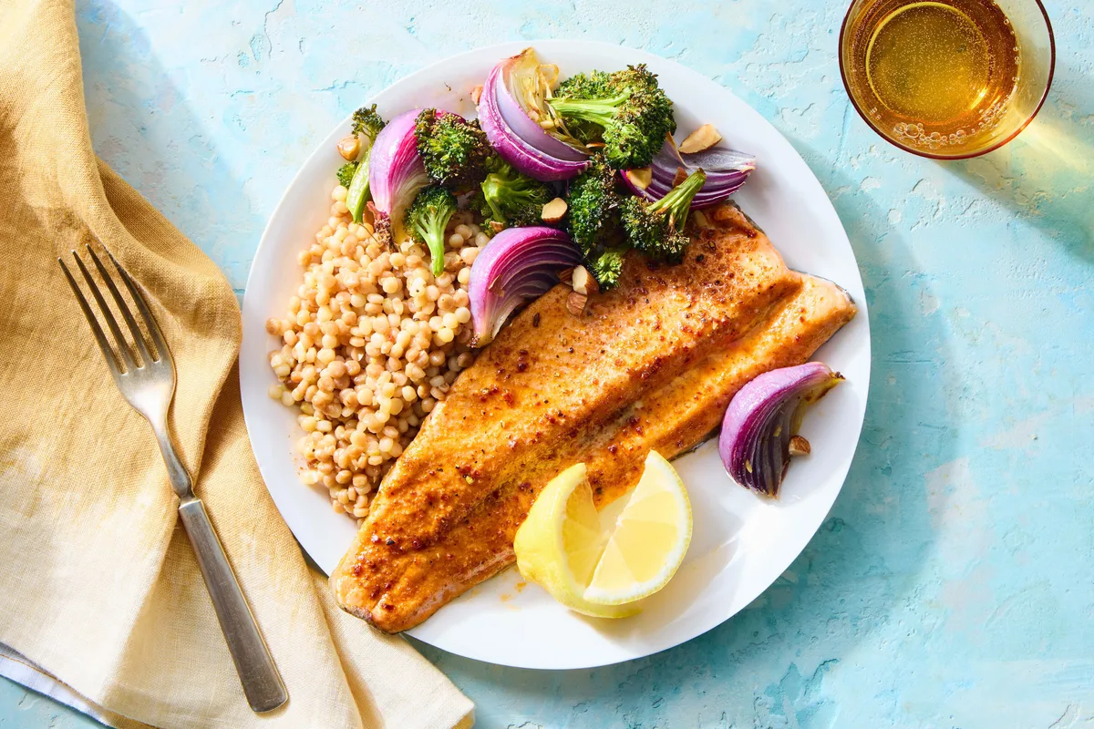 Harissa Wild Salmon With Almonds Roasted Broccoli Pearl Couscous