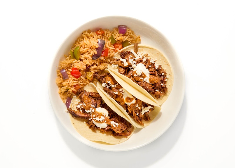 Slow cooked braised pork barbacoa tacos