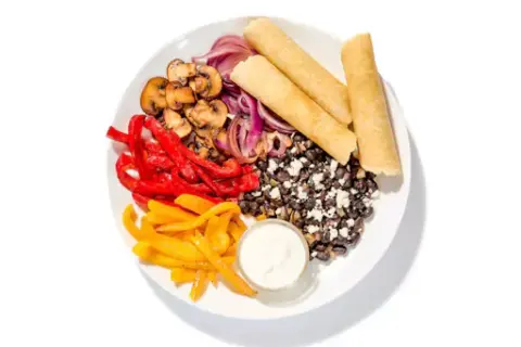 Mushroom Fajita Tacos with Black Beans & Sour Cream