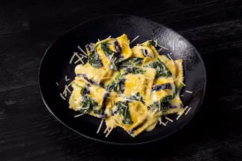 Lobster Ravioli with Garlic Cream Sauce