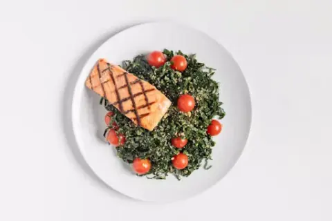 Grilled Salmon over Kale Salad
