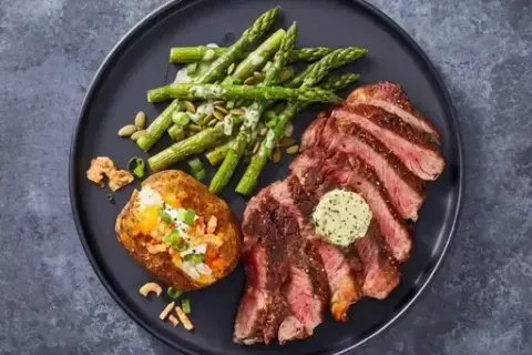 Garlic Herb Rib-Eye & Loaded Baked Potatoes