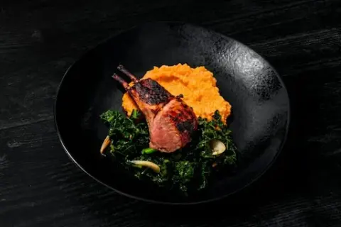 Jerk Lamb Chops with Sweet Potato Grits