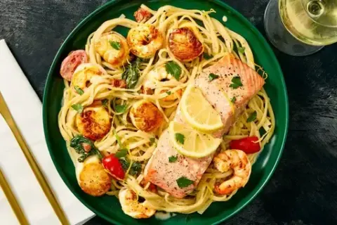 Salmon “en Papillote” over 2x Scallop Linguine