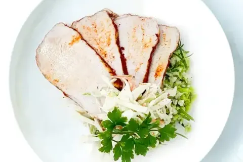 BBQ Rubbed Pork Loin With Broccoli Cauliflower Rice and Caribbean Slaw